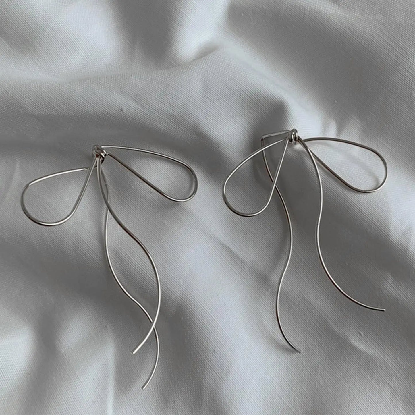 Long Bow Dangle Earrings